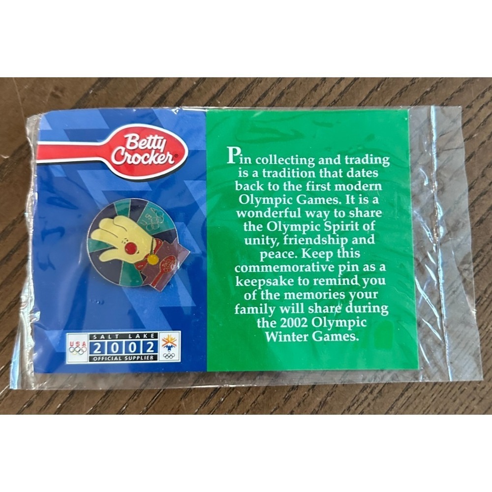 BETTY CROCKER SALT LAKE CITY 2002 OLYMPIC LAPEL PIN HELPING HAND~ NEW IN PACKAGE